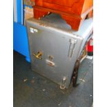 A Ratner steel safe, painted silver, with key, 74cm high, 59cm wide, 61cm deep.