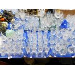 Cut and pressed glassware, including Champagne flutes, wine glasses, tumblers, etc. (5 trays)