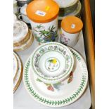 Two Portmeirion pottery storage jars with wooden lids, decorated in the Botanic Garden pattern,