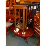 A mahogany coffee table, nest of tables, bow front console table, and an oak plant stand. (4)