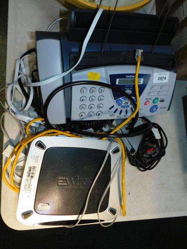 A Brother fax machine, T106, and a BT 2 wire Gateway. (2)