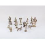 Silver plated figures from history, including Queen Elizabeth I and Richard The Lionheart, dogs,