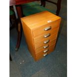 A beech collector's chest, of six drawers, with silvered cup handles, 56cm high, 34cm wide, 25cm