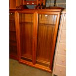 A Legate Furniture teak glazed bookcase, with three adjustable shelves, 128cm high, 84cm wide,