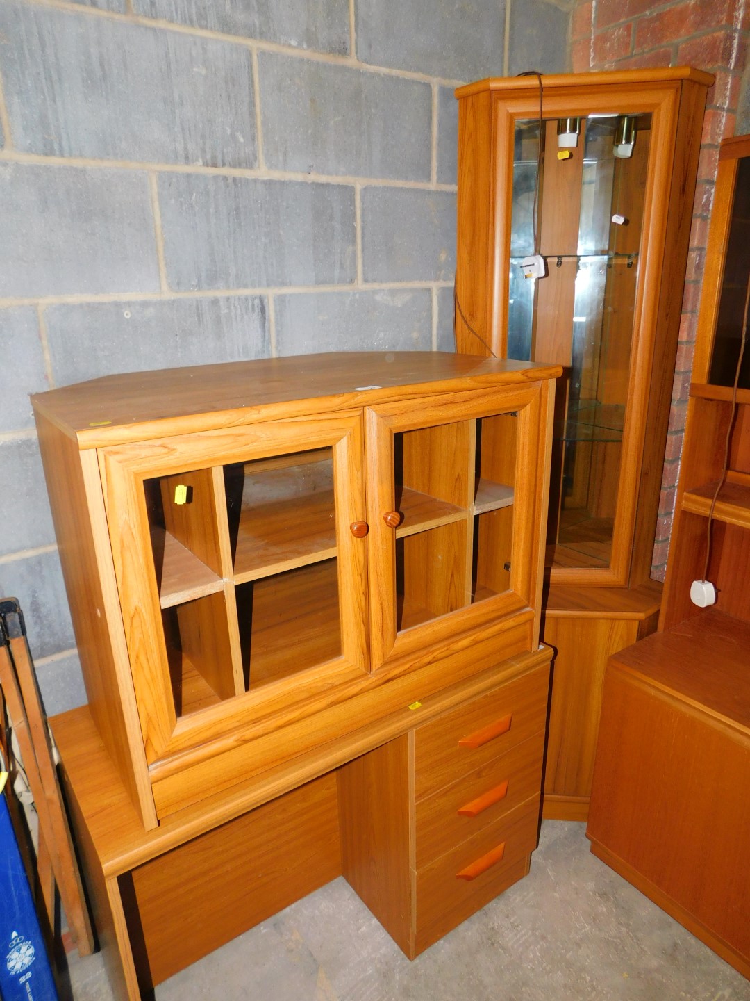 A teak MDF kneehole desk, 94cm wide, corner display cabinet, the top section with glass shelves