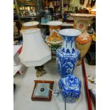 Five modern large Oriental vases, table lamp, wall barometer, and a walking stick. (8)