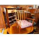 A stick back armchair, an oak students bureau, and an oak veneered drop leaf table. (3)