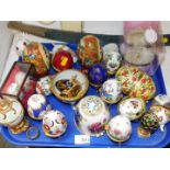 Continental and Chinese porcelain and enamel novelty eggs, together with a pair of cased painted