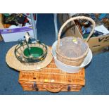 A wicker picnic hamper, unfitted, together with two baskets, two decorative planters, and a cream