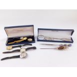 Gentleman's and lady's dress wristwatches, a cameo brooch. magnifying glass and three paper