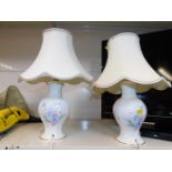 A pair of Aynsley porcelain table lamps, decorated in the Little Sweetheart pattern, with shades,