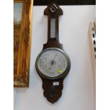 An oak cased aneroid barometer, with thermometer, 80cm high.