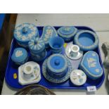 Wedgwood blue Jasperware, to include lidded boxes, lidded jars, urn shaped vase, together with a