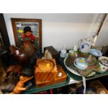 A German Canterbury brass mantel clock, carved wooden figures and boxes, marbles, ceramics and