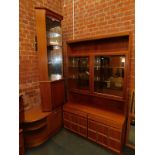 A McIntosh glazed wall cabinet, 58cm high, 113cm wide, 47cm deep., Stateroom low bow front unit,
