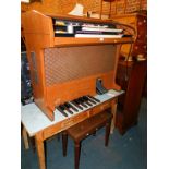 A Belton Supreme electric organ, with stool. (2)