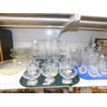 Cut and pressed glassware, including fruit bowls, decanters, sundae dishes, and vasesd. (2 trays