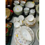 A Minton porcelain part dinner and tea service, decorated in the Spring Bouquet pattern, together