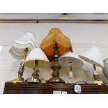 Three brass table lamps, and two onyx table lamps, all with shades. (5)