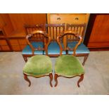A pair of Victorian walnut balloon back single dining chairs, together with three Victorian mahogany