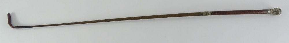 A brown leather riding crop, with gilt white metal mounts cast and embossed with flowers, etc., - Image 3 of 3