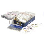 A large quantity of British first day covers pictorial presentation stamps, etc., (two boxes).