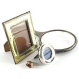 A collection of small silver etc., to include a dressing table mirror, silver plated frame and a