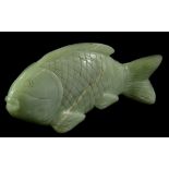 An oriental green hardstone carving of a Carp or Goldfish, 18 cm long.