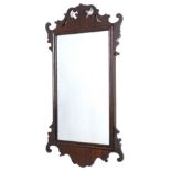 A mahogany fret frame wall mirror, with rectangular plate, 88cm x 48cm.