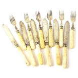 A set of six silver plated fish knives and forks, Sheffield 1900, each with composite handles.