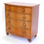 A Victorian mahogany bow front chest of drawers, with a plain top, above two short and three long