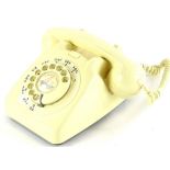 A 1966 GPO 706 ivory coloured telephone, in unissued condition, bell on/off switch fitted.