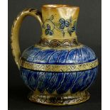 A late 19thC stoneware jug by T. Smith, in the manner of Royal Doulton, with incised decoration in