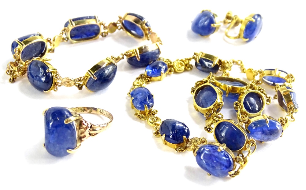 Withdrawn presale by vendor- A 9ct gold polished sapphire set jewellery set, comprising ring, pair