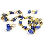 Withdrawn presale by vendor- A 9ct gold polished sapphire set jewellery set, comprising ring, pair