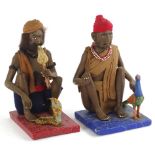 Two Indian pottery sculptures, modelled in the form of a gentleman charming a snake, another with