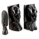 A pair of African hardwood busts, carved in the form of a gentleman and lady, 28cm high and a