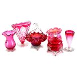 Various items of Victorian and later cranberry tinted glass, to include a posy vase, jug, jar and
