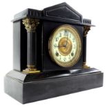 A late 19thC French style black slate and gilt metal portico shaped clock, the enamel style dial