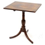 An early 19thC mahogany occasional table, the square tilt top with a reeded edge on turned and