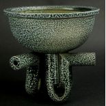 Walter Keeler (b. 1942). A studio stoneware tripod bowl, with all over speckled decoration, the legs