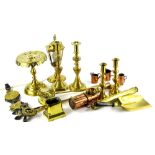 A large quantity of brass and copper, to include fire irons, candlesticks, telescope, trivet,