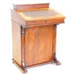 A Victorian walnut and marquetry Davenport, the top with a hinged compartment for pens, etc., the