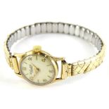 A Russell & Son ladies wristwatch, with small circular watch head, in yellow metal casing, unmarked,