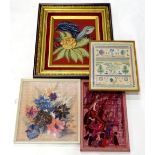 A raised woolwork floral picture. In elaborate simulated rosewood and gilt frame 30cm x 66cm, a