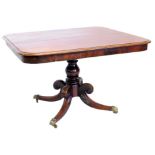 An early 19thC mahogany breakfast table, the rectangular top with a moulded edge on a turned