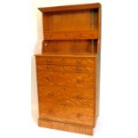 A Victorian satin walnut side cabinet, the raised back with a moulded cornice, above a recess and
