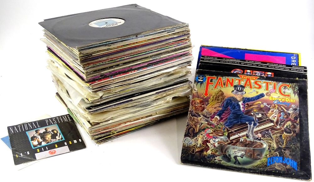 A collection of records, to include Jerry & The Pacemakers, Wings, compilation albums, Roxy Music,