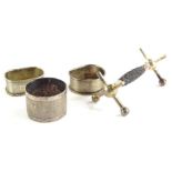 A collection of small silver, to include a silver and part antler single knife rest and three napkin