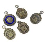 A collection of five athletics fobs, awarded for Stockport Secondary School, engraved to the